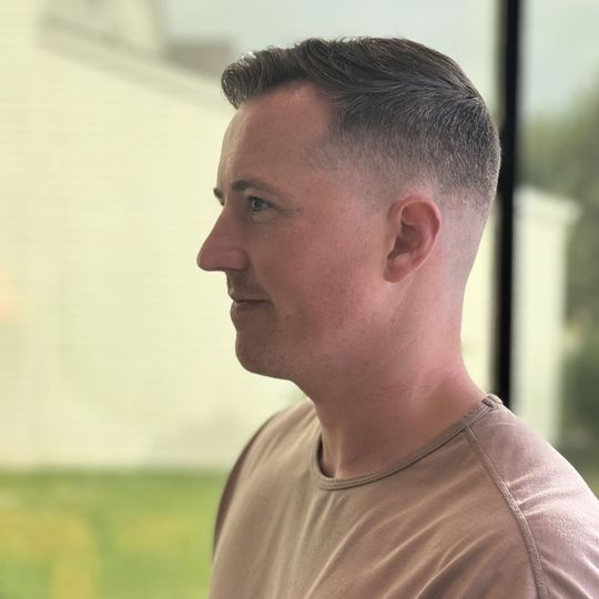 Classic short cut with a clean taper, cut at K8 Fades